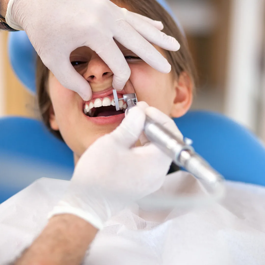 Child receiving a pediatric dental exam